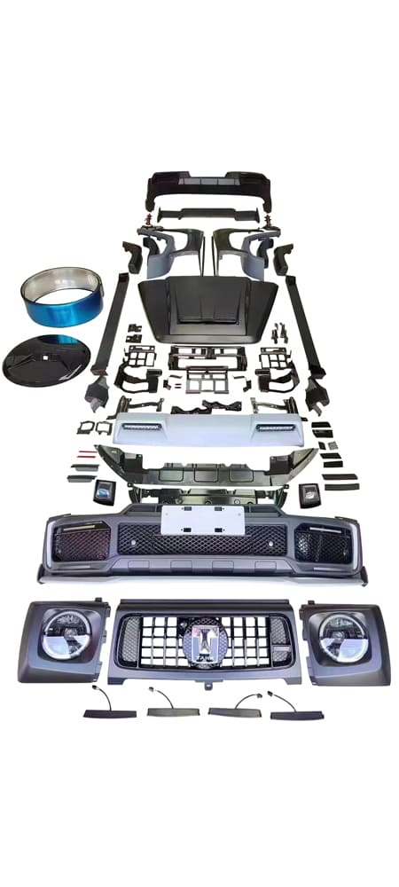 Complete automotive exterior body kit components arranged for project review