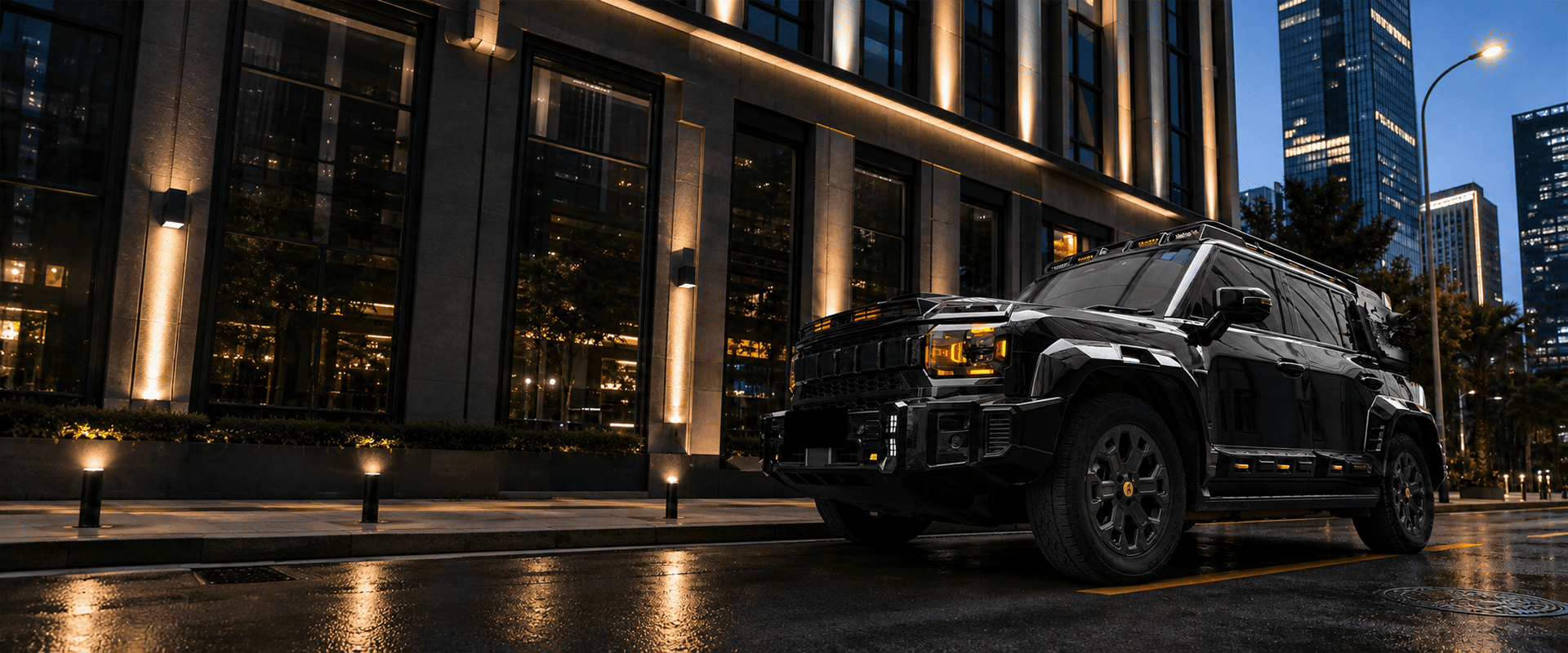 Black off-road SUV with an aftermarket body kit parked in a city at night