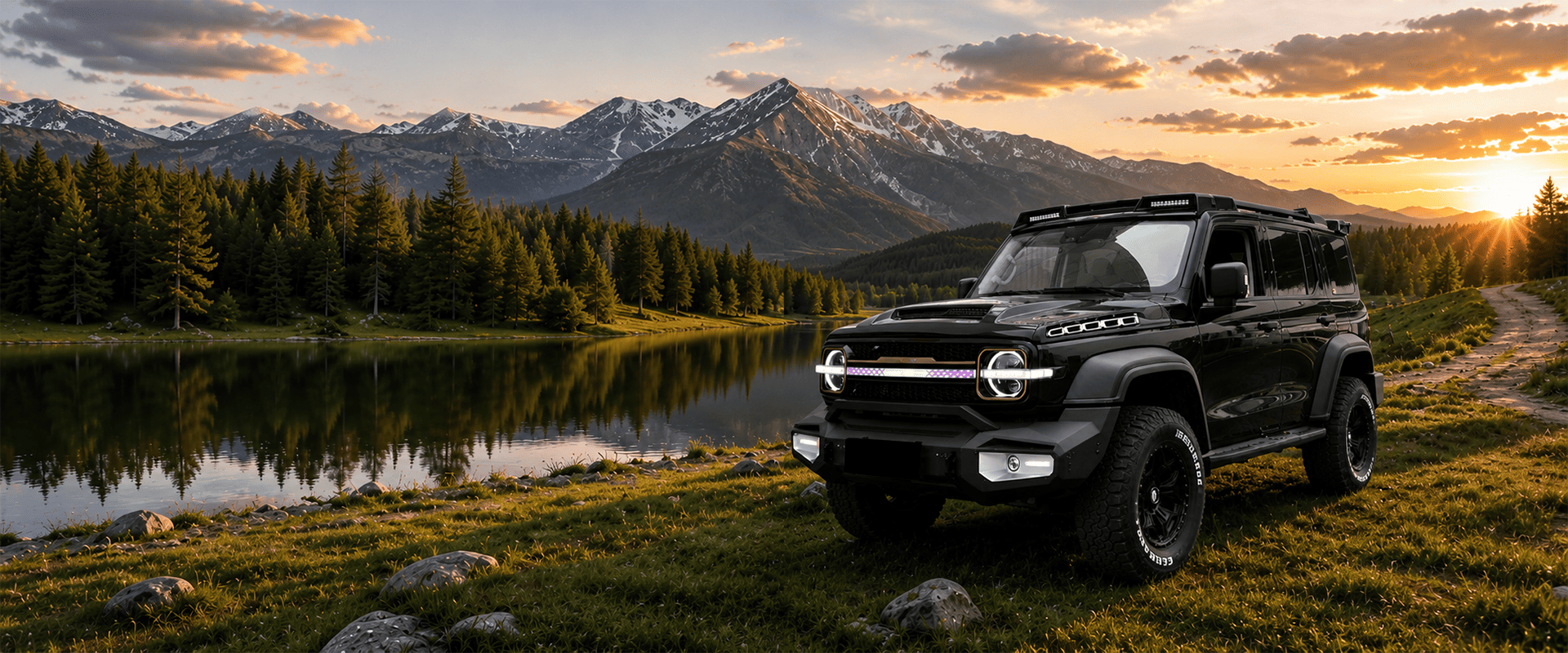 Black modified off-road SUV with exterior body kit beside a mountain lake at sunset