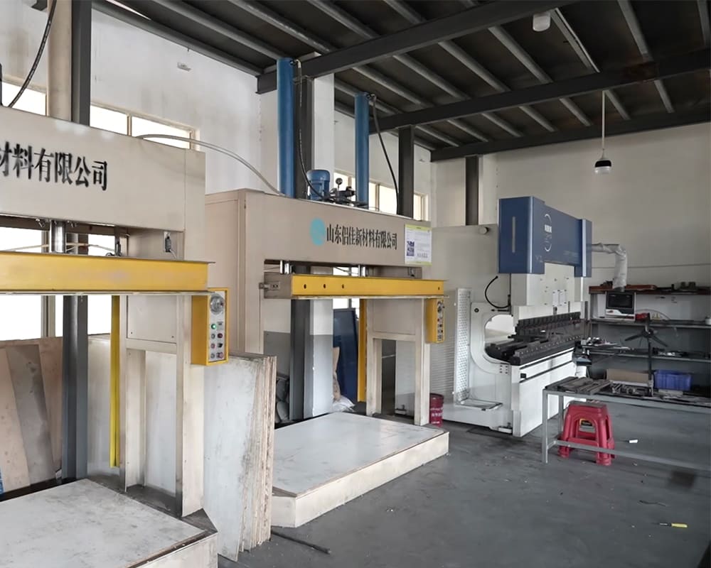 Automotive exterior parts manufacturing equipment inside a production workshop