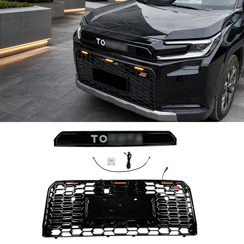 Front grille fitted to a black SUV with grille components displayed below
