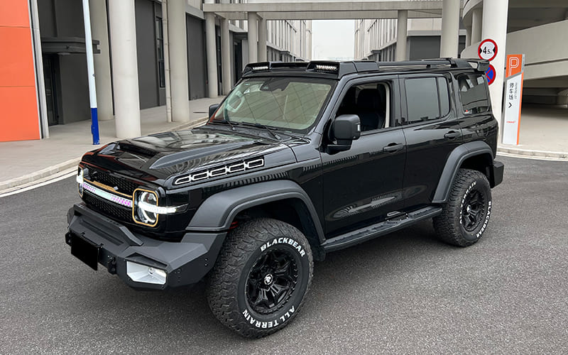 Modified black SUV fitted with a custom exterior body kit