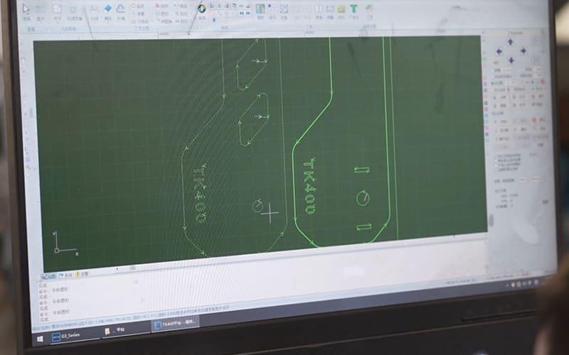 CAD drawing for an automotive exterior component on a computer screen