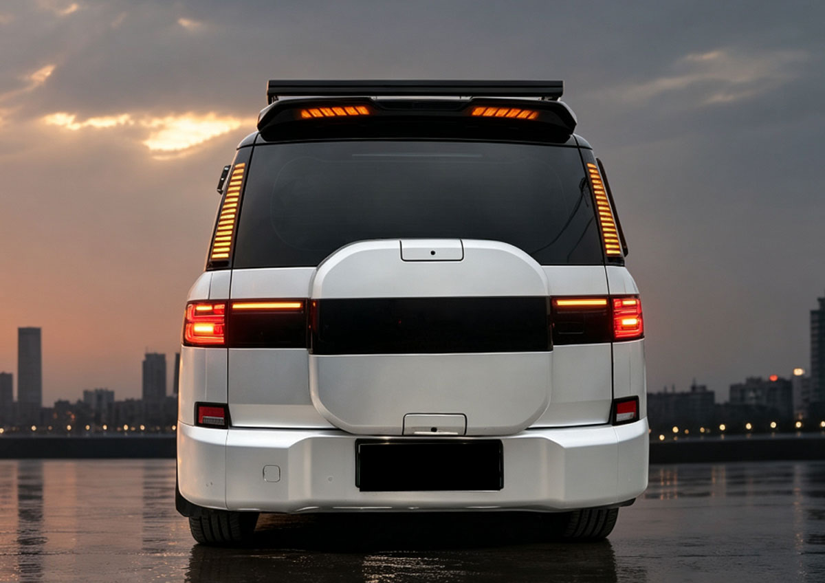 BYD Leopard Ti7 viewed from the rear with the LED spoiler illuminated at dusk