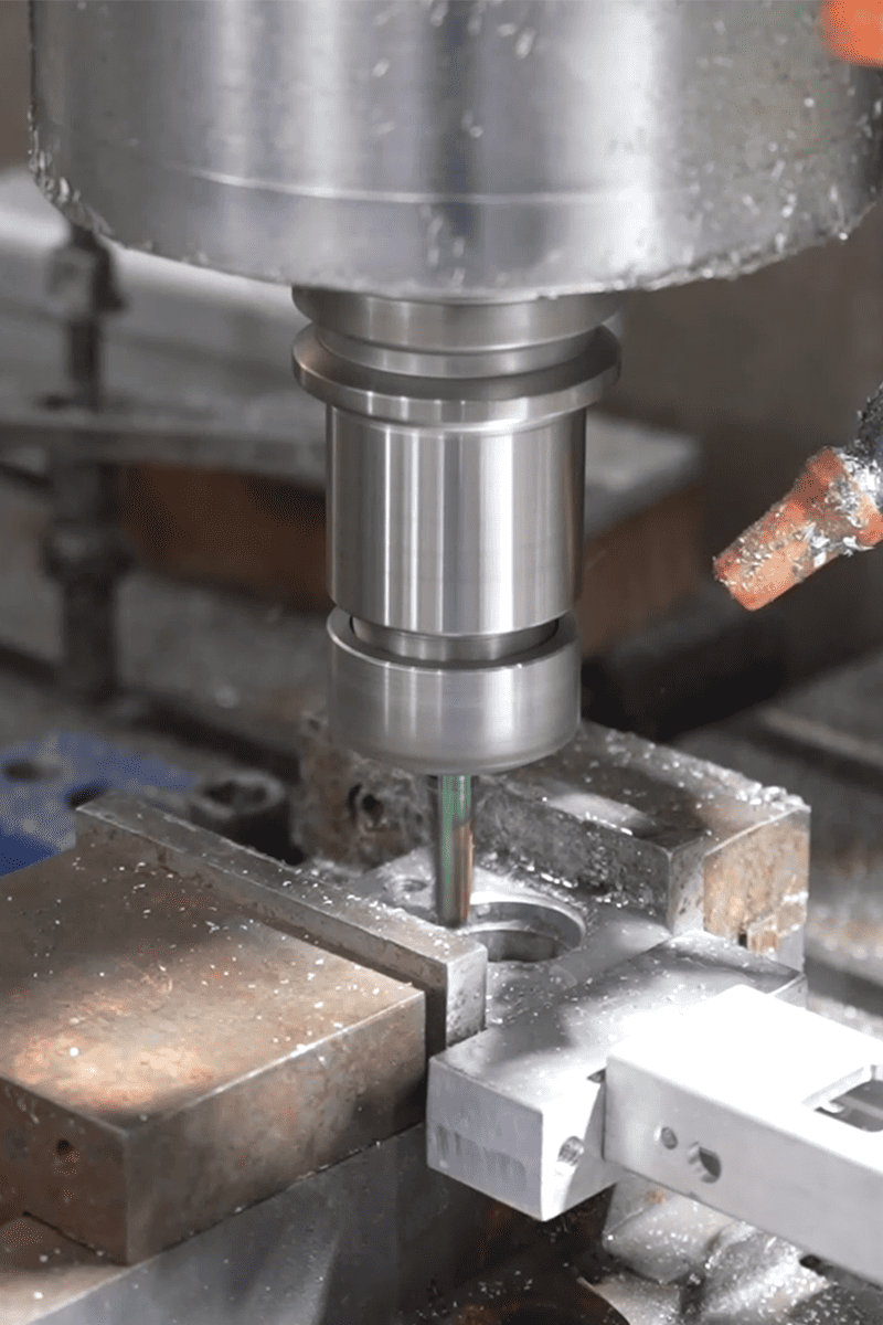 Close-up of CNC machining during exterior accessory manufacturing